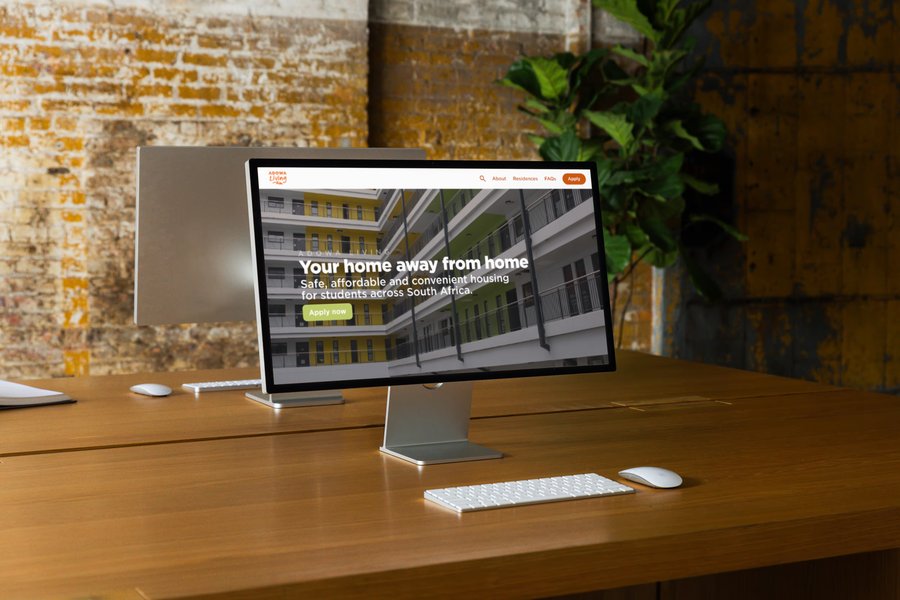 ADOWA Living website on a studio display